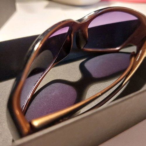 Sunglasses used with plastic frame and purple UV protection lens