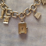 Burberry charm watch bracelet like new, silver plated finish