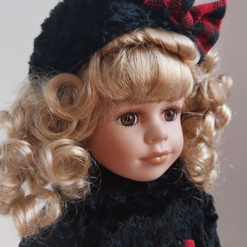 Vintage porcelain doll winter like new from Collector's Choice collection