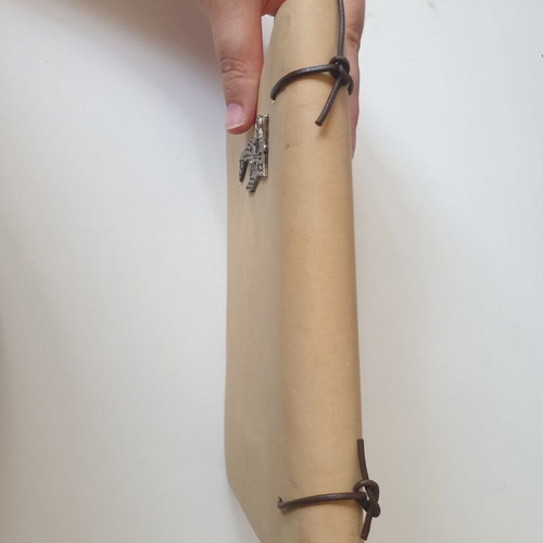 Handmade notebook with leather cover and metal airplane