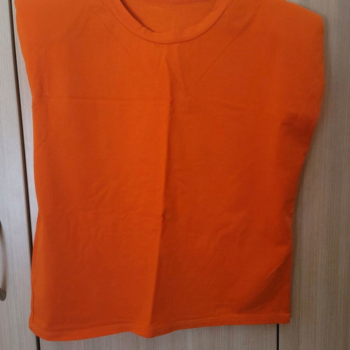 Top with shoulder pads like new, bright orange, cotton