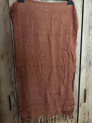 Scarf used, brown color