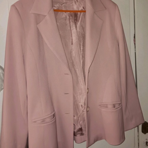 Kanellis Collection soft pink jacket used with wear