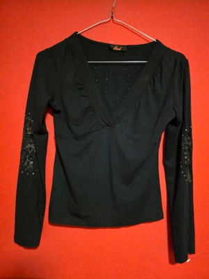 Black top with prints and rhinestones like new