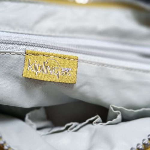 Kipling shoulder bag like new, waterproof fabric, gold color
