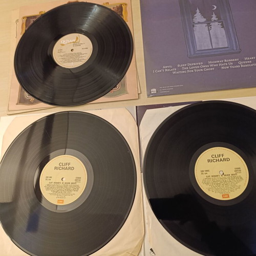 Collection of 4 vinyl records like new