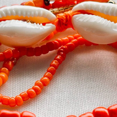 Set of 7 Boho Bracelets new with Shells and Starfish Orange