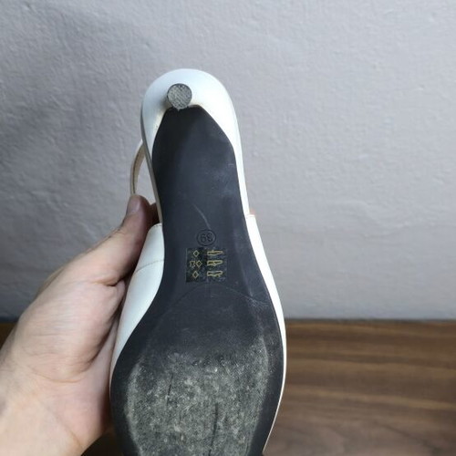 Francescomilano leather slingback pumps size 39 like new, black and white