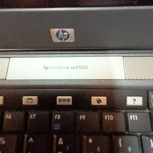 HP Omnibook XE 4500 laptop used with charger, bag and cooling pad