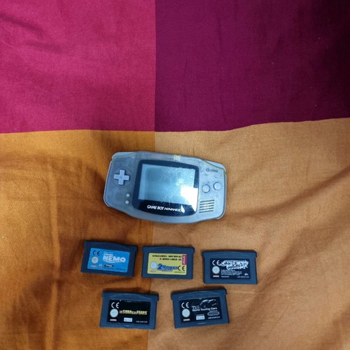 Game Boy Advance used, missing battery cover, with games