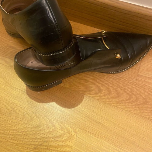 Labrini black moccasins with gold buckle like new, size 38