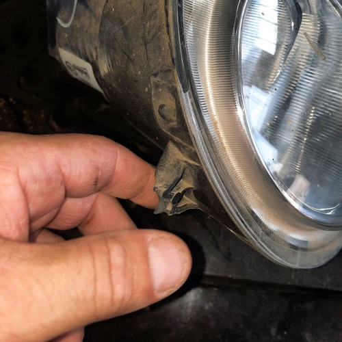 Vw Polo 05mod left front headlight used, broken mount