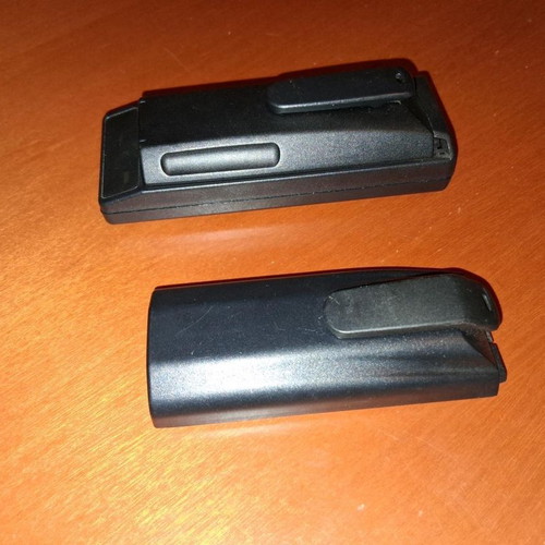 Ericsson charging base and two used batteries Type 4225 and 3009/3008
