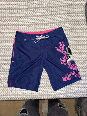 Diesel men's swim shorts used, blue with neon pink details, size L