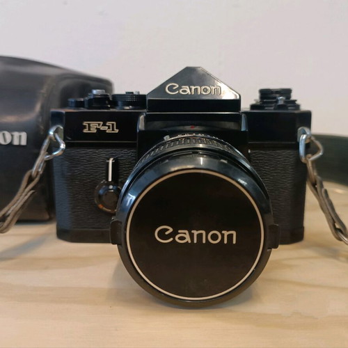 Canon F-1 with 50mm f/1.4 lens used with original leather case