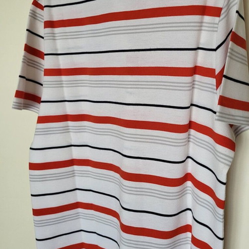 Lacoste polo used, size L, striped white and orange