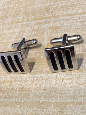 Vintage pair of steel cufflinks used in black and gray