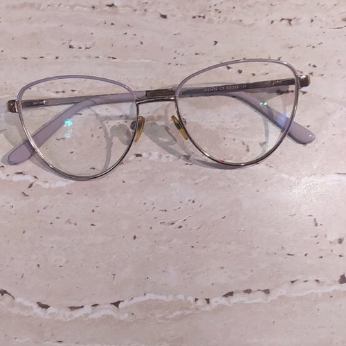 Myopia glasses like new with gold frame and astigmatism