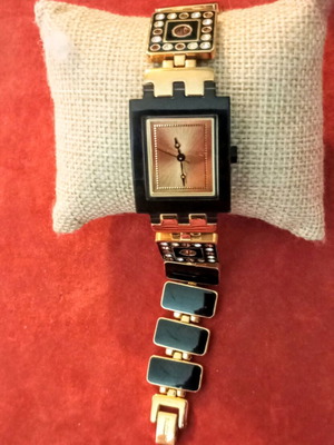 Swatch LUXOTRIC ρολόι κόσμημα με χρυσό καντράν σαν καινούργιο