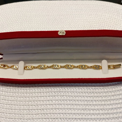 Classic Style Bracelet new with elegant gold and silver weave