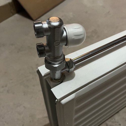 Used two-column radiator 60x40 cm with new switch and metal pipe
