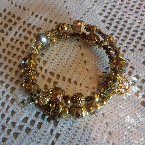 Handmade bracelet new in golden tones
