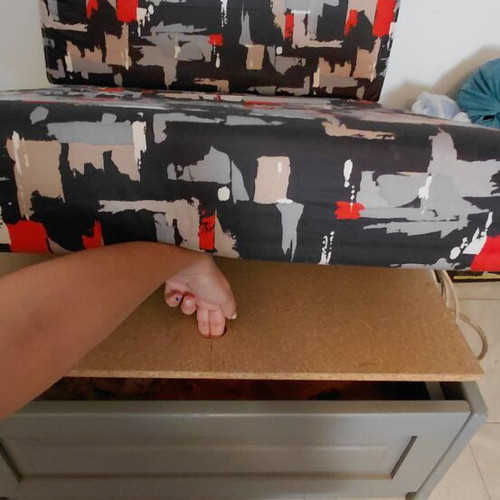 Armchair with storage space used