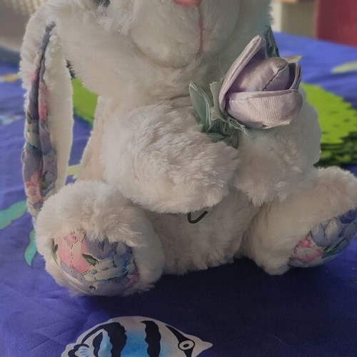 Stuffed bunny used with flower