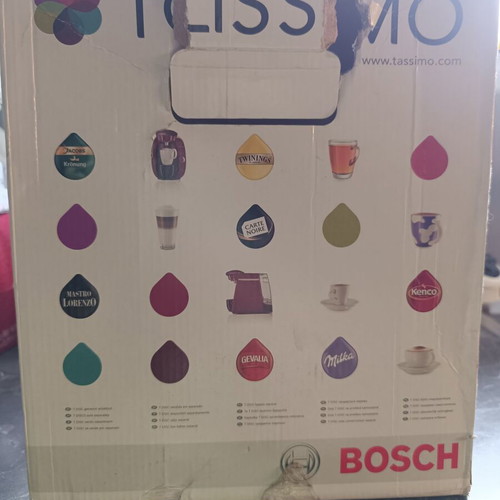 Tassimo coffee machine like new with capsules