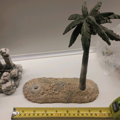 Decorative aquarium rocks used with ancient ruins and palm tree design