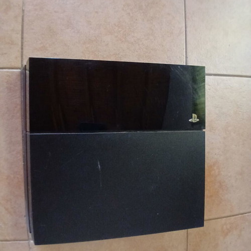 PlayStation 4 base console 500GB used with 4 games