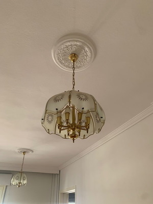 Chandeliers brass and glass with designs, like new, set of 2