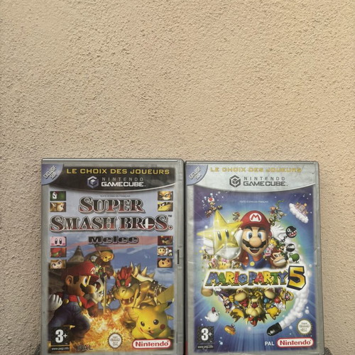 GameCube empty cases with Mario manual