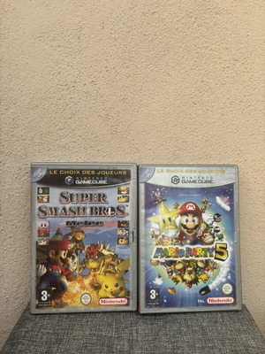 GameCube empty cases with Mario manual