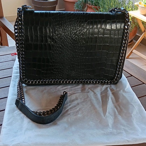 Black leather crossbody bag like new with silver chain