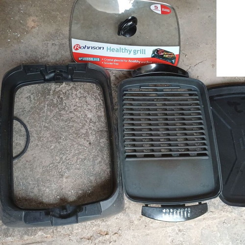 Electric grill used 2200 W with glass lid and adjustable thermostat