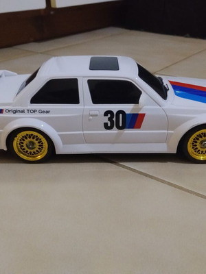 Electric toy car with drift and on-road wheels