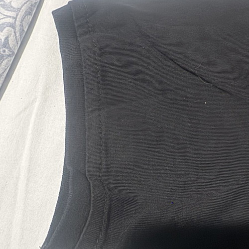 Men's black t-shirt with Joker print, rounded hem