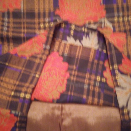 Plaid floral skirt used with waistband and back slit