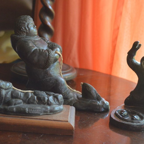 Three Inuit figurines used, indigenous Eskimo creations from Canada