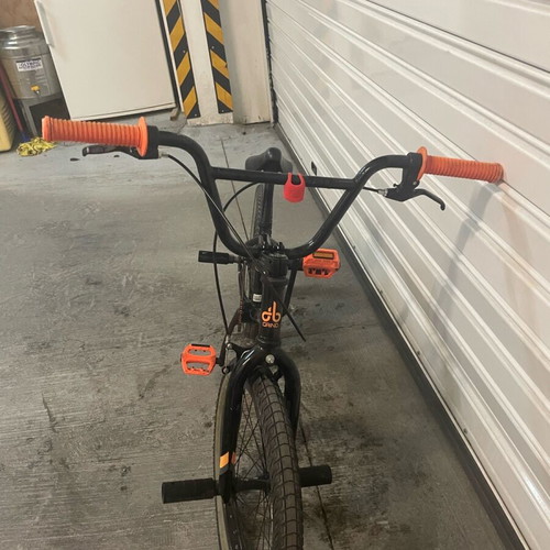 BMX bicycle like new, black, with extra metal pegs for tricks