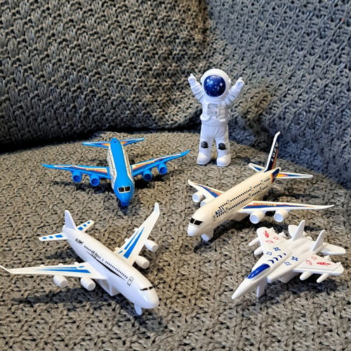 Plastic airplane set, spaceship and astronaut used
