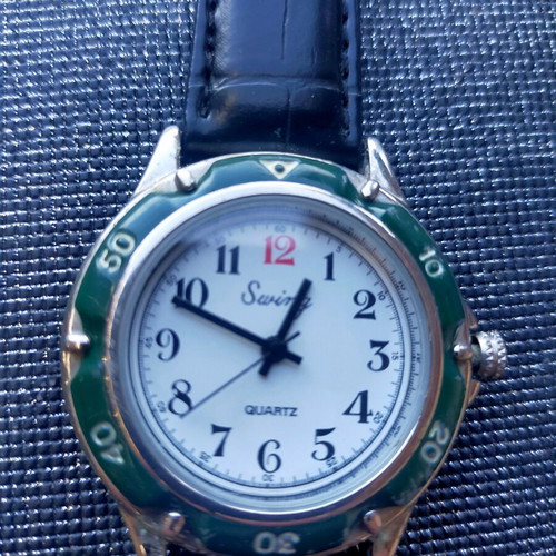 Watch used, unisex, green
