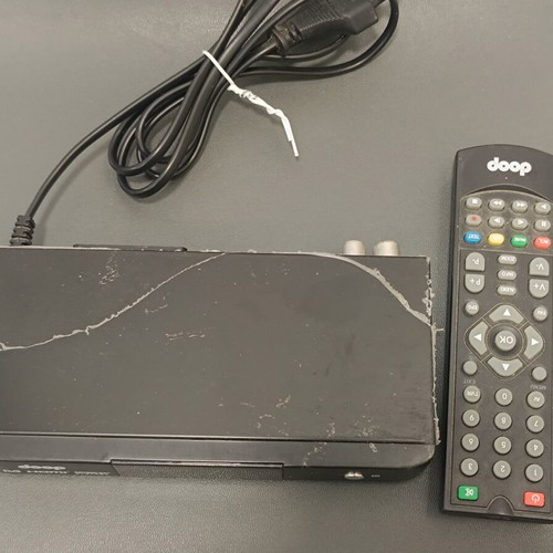 Doop DVB-T HD HDMI digital TV decoder used with remote control