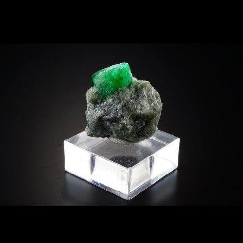 Emerald mineral in rock new with deep green color