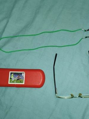 Children's prescription glasses used, black and green