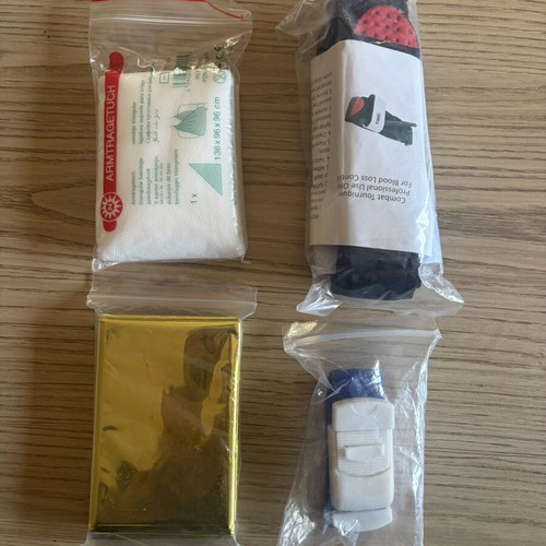 First Aid Set with Tourniquet, Triangular Bandage, Phlebotomy Band, and Survival Blanket new