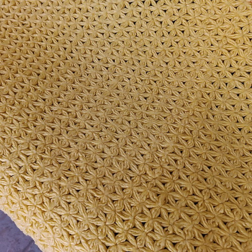 Handmade knitted yellow blanket used