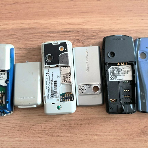 Lot of used Nokia and Sony Ericsson mobile phones from early 2000s