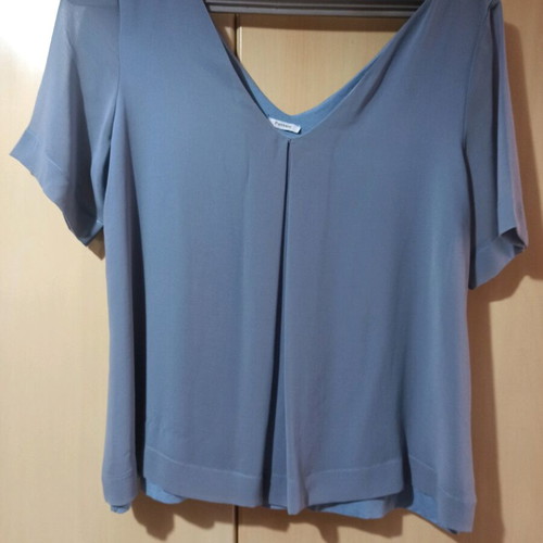 Turquoise blouse like new, lightly worn, with transparent sleeves size M